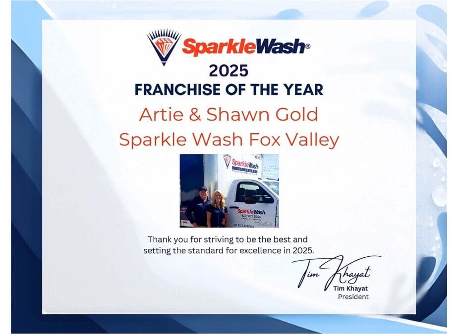 Sparkle Wash 2025 Franchise of the Year certificate awarded to Artie and Shawn Gold of Sparkle Wash Fox Valley
